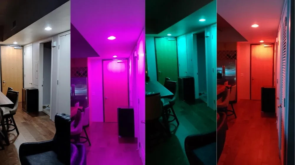 Indoor hallway with RGB color changing LED bulbs in white, pink, teal, and red lighting